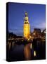 Floodlit Tower at Twilight Reflected in the Canal, Oudeschams, Amsterdam, the Netherlands (Holland)-Richard Nebesky-Stretched Canvas