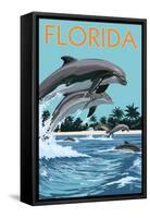 Florida - Dolphins Jumping-Lantern Press-Framed Stretched Canvas