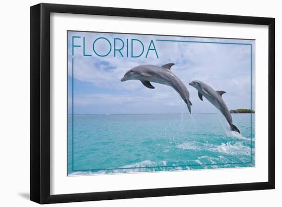 Florida - Jumping Dolphins-Lantern Press-Framed Art Print