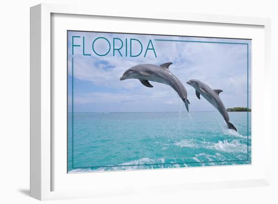 Florida - Jumping Dolphins-Lantern Press-Framed Art Print