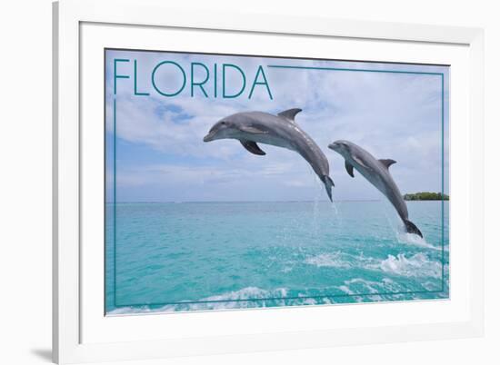 Florida - Jumping Dolphins-Lantern Press-Framed Premium Giclee Print