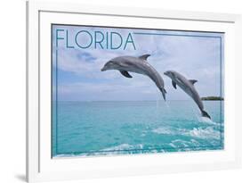 Florida - Jumping Dolphins-Lantern Press-Framed Premium Giclee Print