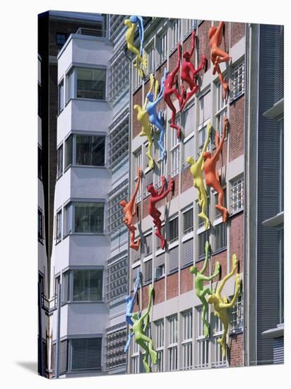 Flossies Figures Covering a Building Facade at the Medienhafen, Dusseldorf, North Rhine Westphalia-Yadid Levy-Stretched Canvas