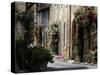 Flower Bedecked Street, St. Cyprien, Dordogne, France, Europe-Peter Richardson-Stretched Canvas