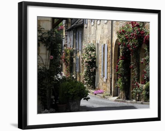 Flower Bedecked Street, St. Cyprien, Dordogne, France, Europe-Peter Richardson-Framed Photographic Print