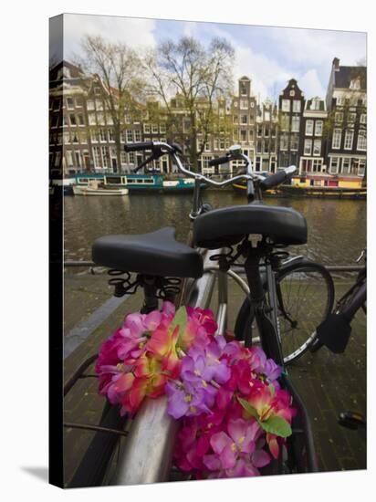 Flower Chain Holding Two Bicycles Together, Amsterdam, Netherlands, Europe-Amanda Hall-Stretched Canvas