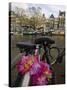 Flower Chain Holding Two Bicycles Together, Amsterdam, Netherlands, Europe-Amanda Hall-Stretched Canvas
