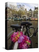 Flower Chain Holding Two Bicycles Together, Amsterdam, Netherlands, Europe-Amanda Hall-Stretched Canvas