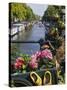 Flower Filled Cart with Houseboats and Canal, Amsterdam, North Holland, the Netherlands-Tom Haseltine-Stretched Canvas
