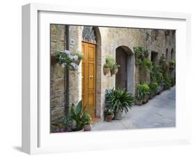 Flower Pots and Potted Plants Decorate a Narrow Street in Tuscan Village, Pienza, Italy-Dennis Flaherty-Framed Photographic Print