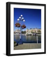 Flower Pots Hanging on Street Light-James Randklev-Framed Photographic Print