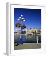 Flower Pots Hanging on Street Light-James Randklev-Framed Photographic Print