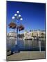 Flower Pots Hanging on Street Light-James Randklev-Mounted Photographic Print