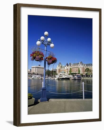 Flower Pots Hanging on Street Light-James Randklev-Framed Photographic Print