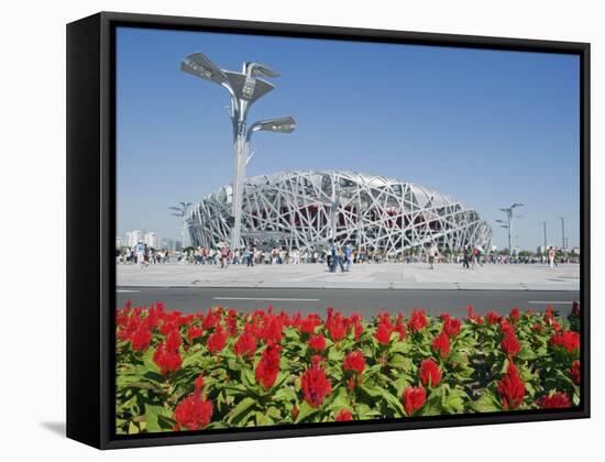 Flowers and the Birds Nest National Stadium in the Olympic Green, Beijing, China-Kober Christian-Framed Stretched Canvas