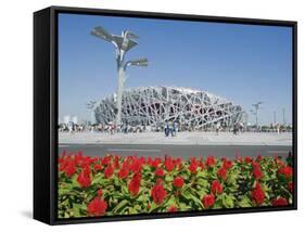 Flowers and the Birds Nest National Stadium in the Olympic Green, Beijing, China-Kober Christian-Framed Stretched Canvas