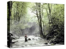 Fly Fisherman Near a Stone Bridge-null-Stretched Canvas