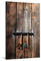 Fly Fishing Rods On The Side Of An Angler's Warming Hut-Ben Herndon-Stretched Canvas