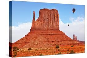 Fly over the Valley Huge Balloons. Navajo Reservation in Arizona and Utah. Stone Desert and Rocks --kavram-Stretched Canvas