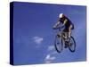 Flying Cyclist-null-Stretched Canvas