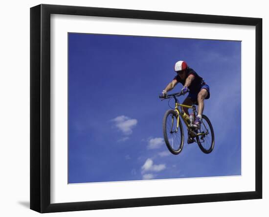 Flying Cyclist-null-Framed Premium Photographic Print
