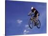 Flying Cyclist-null-Stretched Canvas
