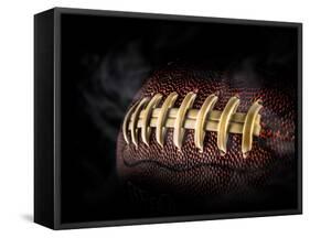 Flying Rugby Ball Isolated on Black.-Kesu01-Framed Stretched Canvas
