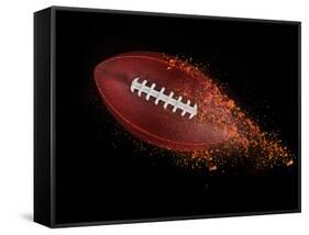 Flying Rugby Ball Isolated on Black.-Kesu01-Framed Stretched Canvas