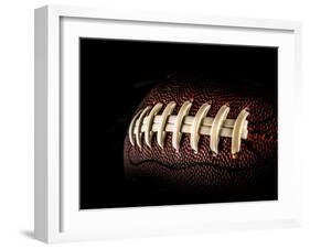 Flying Rugby Ball Isolated on Black.-Kesu01-Framed Photographic Print