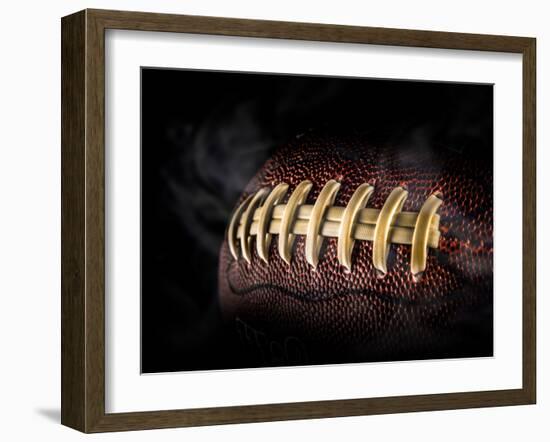 Flying Rugby Ball Isolated on Black.-Kesu01-Framed Photographic Print