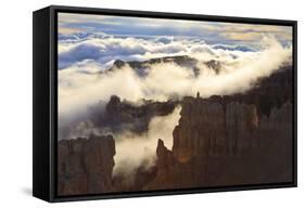 Fog and Clouds of a Partial Temperature Inversion Surround the Red Rocks of Bryce Canyon-Eleanor-Framed Stretched Canvas