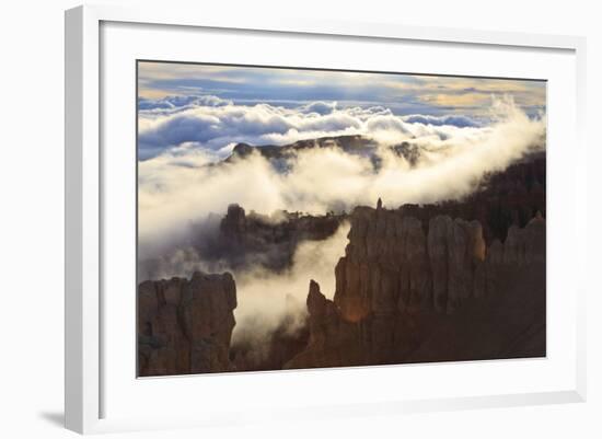 Fog and Clouds of a Partial Temperature Inversion Surround the Red Rocks of Bryce Canyon-Eleanor-Framed Photographic Print