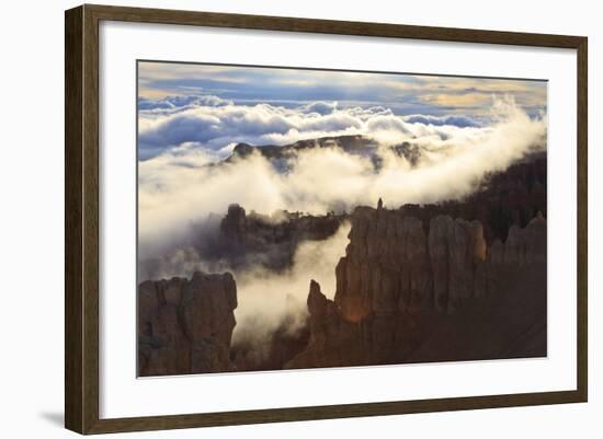 Fog and Clouds of a Partial Temperature Inversion Surround the Red Rocks of Bryce Canyon-Eleanor-Framed Photographic Print