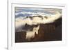 Fog and Clouds of a Partial Temperature Inversion Surround the Red Rocks of Bryce Canyon-Eleanor-Framed Photographic Print