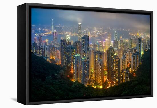 Fog envelops Hong Kong on a summer night seen from Victoria Peak, Hong Kong, China, Asia-Logan Brown-Framed Stretched Canvas