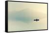 Fog over the Lake. Silhouette of Mountains in the Background. the Man Floats in a Boat with a Paddl-Maryna Patzen-Framed Stretched Canvas