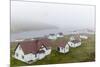 Fog Rolls in over the Small Preserved Fishing Village of Battle Harbour-Michael Nolan-Mounted Photographic Print