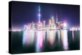 Foggy yet colorful skyline of Shanghai Pudong at night, Shanghai, China, Asia-Andreas Brandl-Stretched Canvas