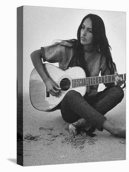Folk Singer Joan Baez Strumming Her Guitar on the Beach Near Her Home-Ralph Crane-Stretched Canvas