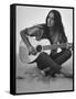 Folk Singer Joan Baez Strumming Her Guitar on the Beach Near Her Home-Ralph Crane-Framed Stretched Canvas