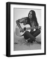 Folk Singer Joan Baez Strumming Her Guitar on the Beach Near Her Home-Ralph Crane-Framed Premium Photographic Print