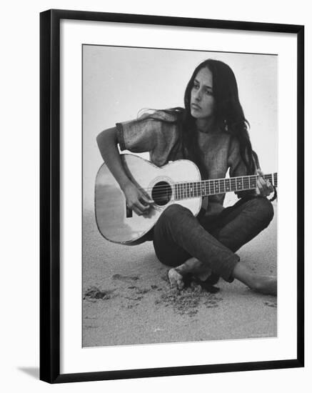 Folk Singer Joan Baez Strumming Her Guitar on the Beach Near Her Home-Ralph Crane-Framed Premium Photographic Print