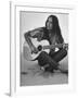 Folk Singer Joan Baez Strumming Her Guitar on the Beach Near Her Home-Ralph Crane-Framed Premium Photographic Print