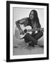 Folk Singer Joan Baez Strumming Her Guitar on the Beach Near Her Home-Ralph Crane-Framed Premium Photographic Print