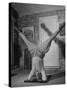 Folk Singer John Jacob Niles Performing Elbow-Standing Exercise, Adapted from Yoga, to Relax-null-Stretched Canvas