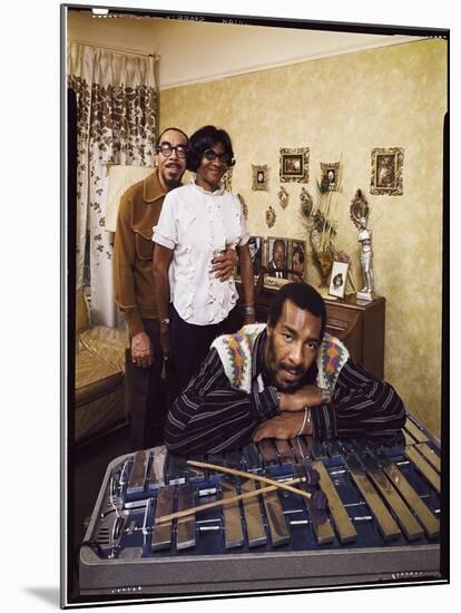 Folk Singer Richie Havens Leaning on Xylophone with Parents: Richard and Mildred in Background-John Olson-Mounted Photographic Print