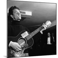 Folk Singer Woody Guthie Performing with Guitar Emblazoned with "This Machine Kills Fascists"-Eric Schaal-Mounted Premium Photographic Print