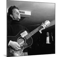 Folk Singer Woody Guthie Performing with Guitar Emblazoned with "This Machine Kills Fascists"-Eric Schaal-Mounted Premium Photographic Print