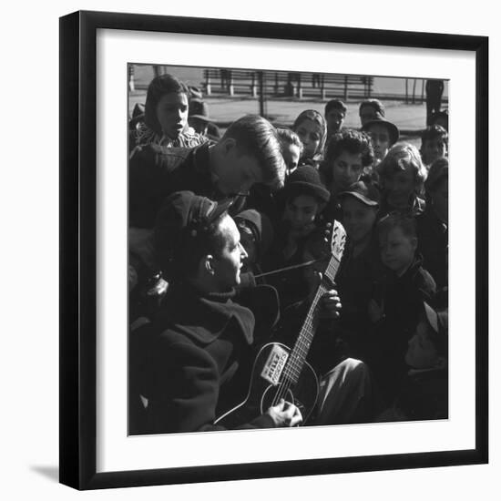 Folk Singer Woody Guthrie Playing Guitar for Group of Children-Eric Schaal-Framed Premium Photographic Print