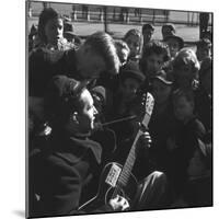 Folk Singer Woody Guthrie Playing Guitar for Group of Children-Eric Schaal-Mounted Premium Photographic Print